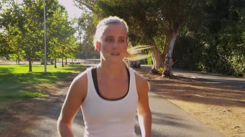 Young woman jogging in park
