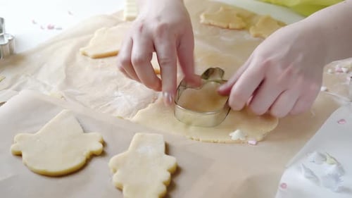 Female Hands Cutting Pastry Dough Into Lolly Ice Cream Shape