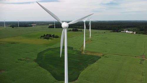 Wind Turbines in Rural Green Field Aerial View