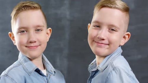 Two Blonde-Haired Boys Smiling for Camera
