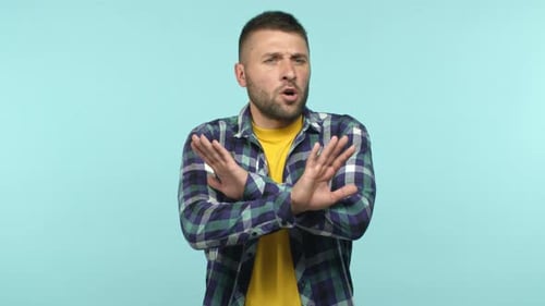 Slow Motion Caucasian Adult Man with Bristle Saying No Shaking Head and Hands to Refuse Offer