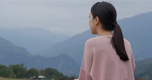 Woman enjoy the view at countryside