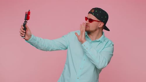 Man Blogger Take Selfie on Mobile Phone Selfie Stick Communicate Video Call Online with Subscribers