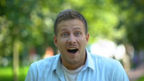 Man's Surprised Reaction in the Park