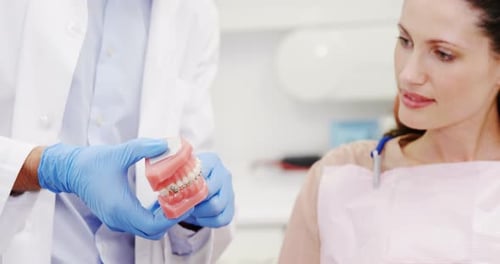 Woman Receives Braces Consultation in Dental Office