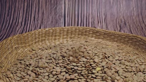 Lentils Falling into Basket for Meal Preparation