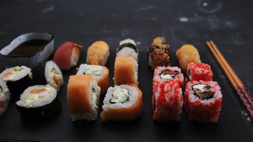 Close up Sushi Rolls Variety with Chopsticks