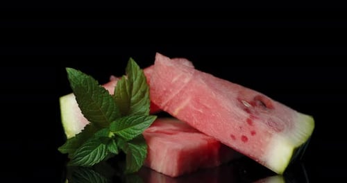 Fresh Watermelon Slices with Mint Leaves Rotating