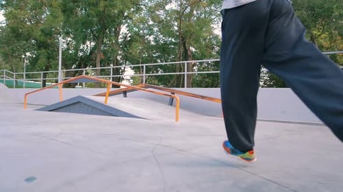 Young Man Doing Parkour Tricks in Extreme Sports Park