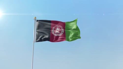 Realistic Waving Flag of Afghanistan in Clear Blue Sky