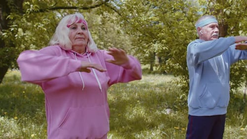 Athletic Fitness Senior Sport Man Woman Grandparents Training Cardio Workout in Park at Morning