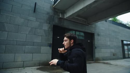 Man Boxer Training Punch on Workout Outdoor, Sportsman Practicing Boxing Beats
