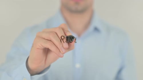 Man Writes Rising Interest Rate with Marker