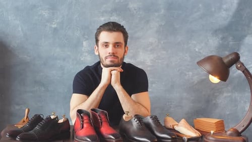 Young Adult Man Posing With Men's Dress Shoes