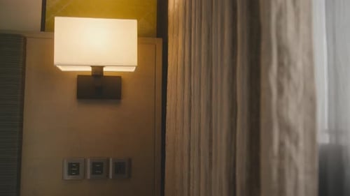 dolly shot of close up brown curtain and white sheer interior design in house or hotel