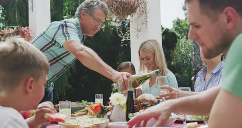 Family Meal Outdoors, Food and Drinks on Table