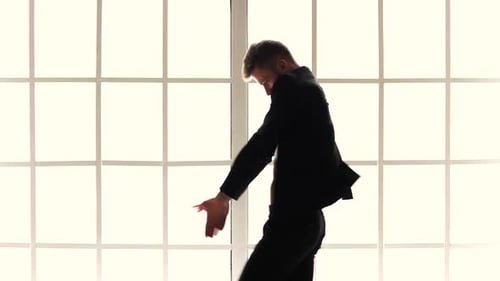 Adult Male Dancer on White Studio Background
