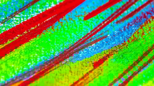 Fond à partir de différents traits de peinture rouge, jaune, verte et bleue