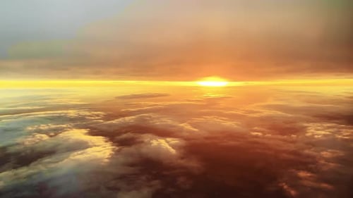 Aerial Sunrise Above Clouds in a Tropical Sky