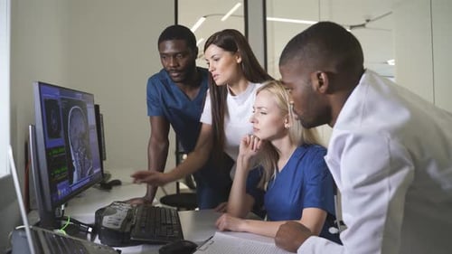 Medical Team Analyzing Brain Scan Together