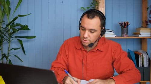 Young Adult Participating in Virtual Meeting at Home
