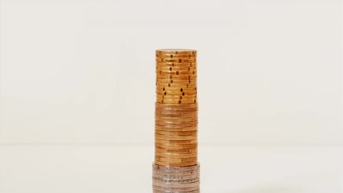 Tall Stack of Coins Diminishing