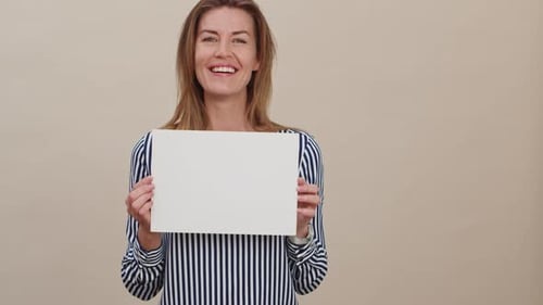 Woman Holds Blank Sign with Expressive Emotions