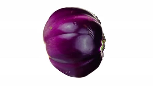 Large Round Eggplant with Leaves Turns Around on White
