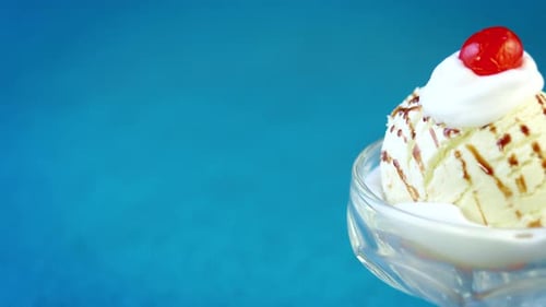 Ice Cream Sundae With Cherry and Chocolate Syrup