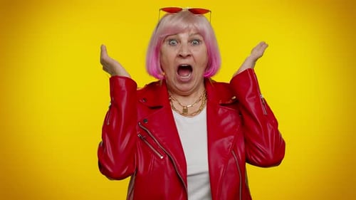Senior Woman Reacting with Shock and Surprise