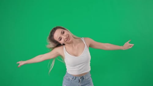 Stylish Woman Dancing Happily on Green Screen