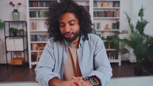 Camera View Young Arabian Man Talks and Smiling During Online Interview