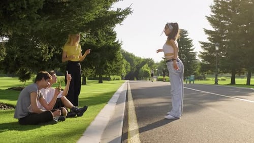 Group of Hipsters Teenagers Having Fun in Park on Road Teenage Girl Dancing Street Dance