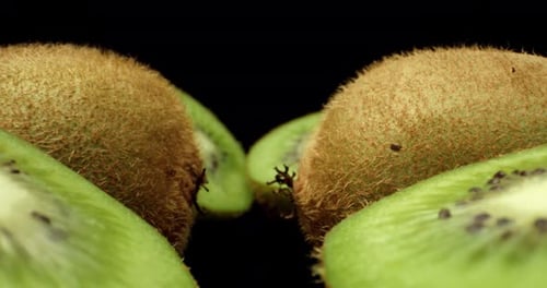 green kiwi fruit cut in half close up macro