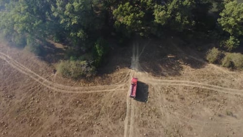 Firefighter truck and fire in the forest. Firefighter car inside the forest
