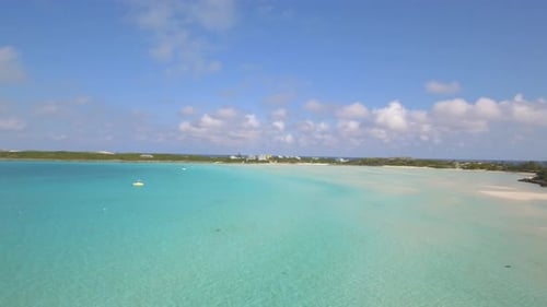 Aerial drone view of a fishing motor boat in the Bahamas, Caribbean.