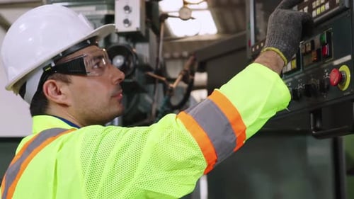 Smart Factory Worker Using Machine in Factory Workshop
