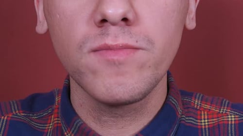 Close Up. Man Eating Hamburger