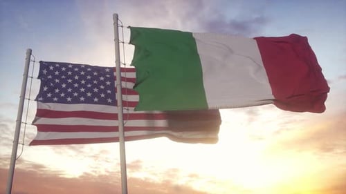 Realistic American and Italian Flags Waving in Sunset Sky