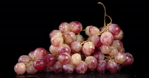 A Bunch of Fragrant Grapes Slowly Rotating.