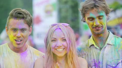 Happy People Celebrating Holi Festival, Throwing Colorful Powder