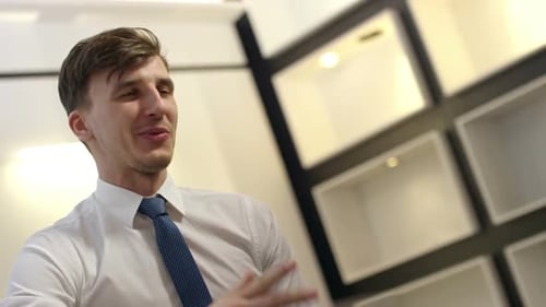 Business Handshake in a Modern Office Setting