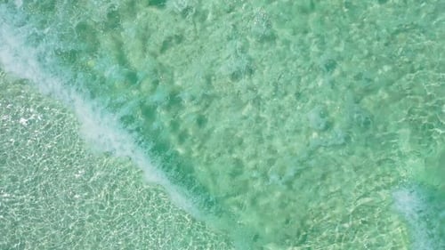 Aerial above scenery of tropical shore beach trip by blue sea with white sand background of a dayout