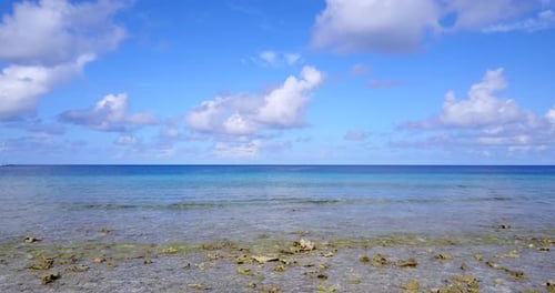 Daytime aerial abstract view of a white sand paradise beach and blue water background in colorful 4K