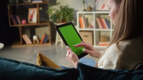 Woman Using Gadget Tablet with Green Screen