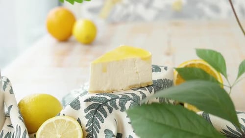 Delicious Cheesecake Slice with Lemons and Oranges