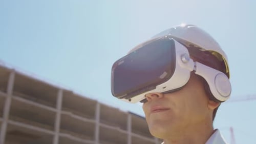 Workplace of freelance worker at home office. Young man works using computer.