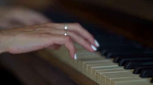 Elegant Hands Playing Beautiful Piano Music