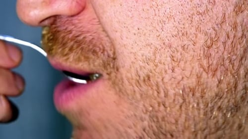 Close-up Man Eating Baklava