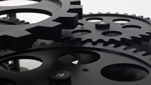 Rotating Matte Black Gears Turning Slowly